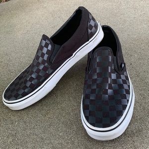 black checkered vans. size 9.5 in mens. 11 in womens
